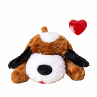 Dark-colored dog with a white patch on its head